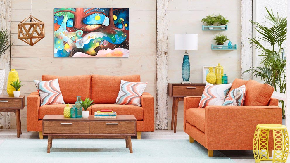 Living room with orange sofas, wooden coffee table, and colorful artwork on the wall.