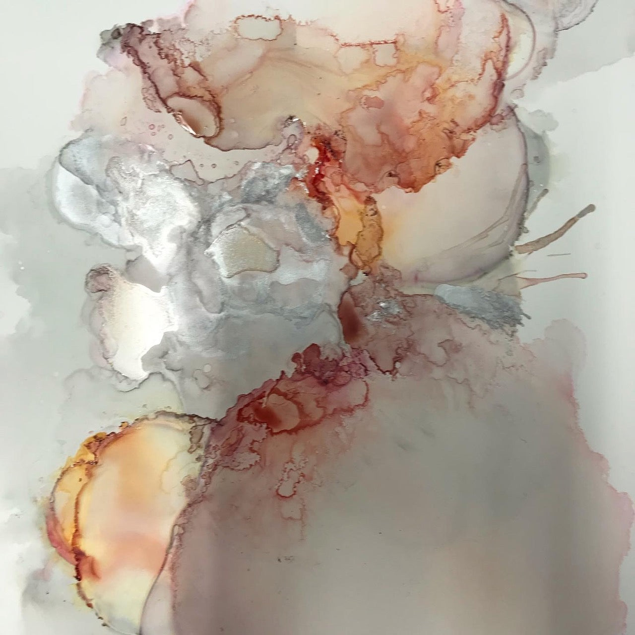 Abstract alcohol ink painting with muted rusty colours